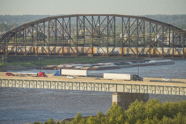 autos train and barges along the mississipp river