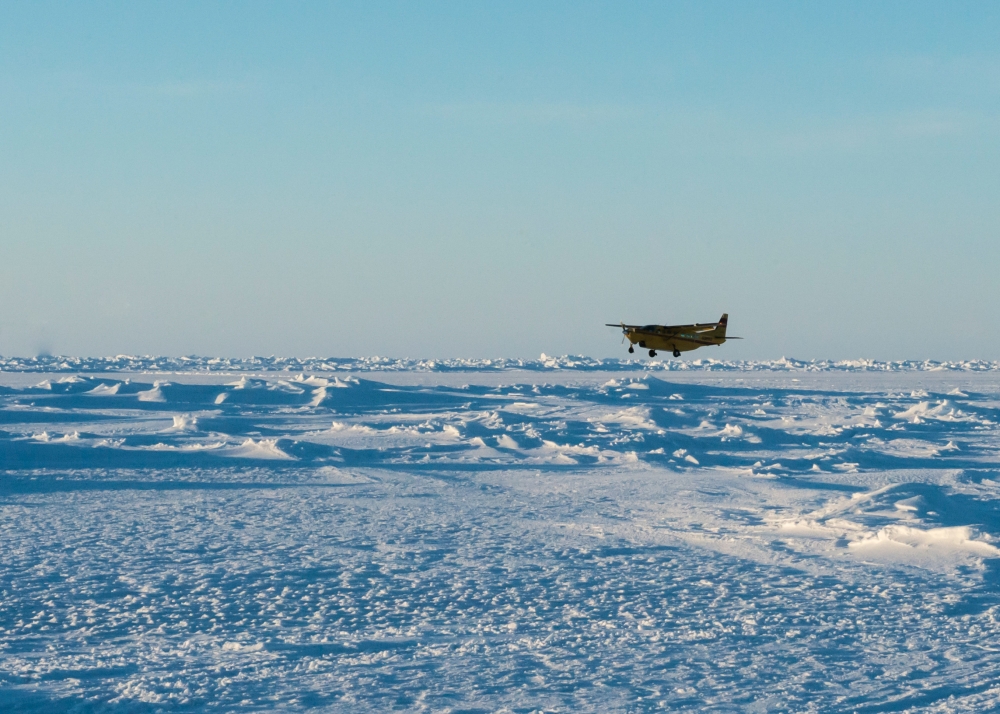 cessna carrying supplies and passengers lands on an ice runway a