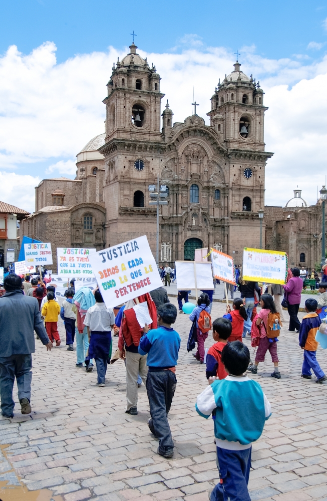 children holding justice signs plaza de armas photo  004
