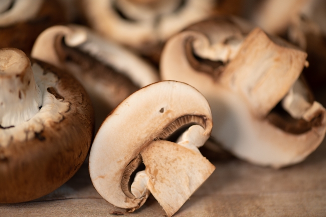 closeup portebello mushroom wood background