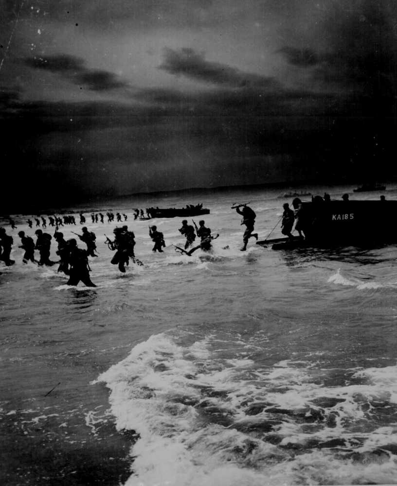 Coast Guard-manned sea-horse landing craft American troops leap forward to storm