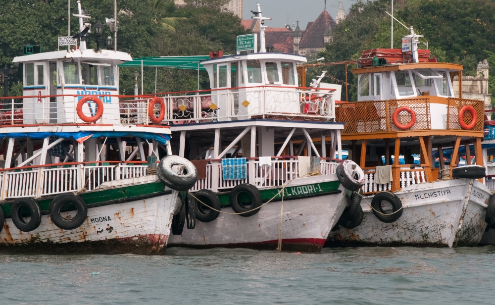 Colorful boats docked near Gateway of India Mumbai