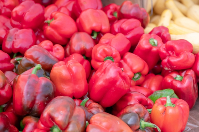 Colorful Fresh Bell Peppers Displayed at Farmers Market