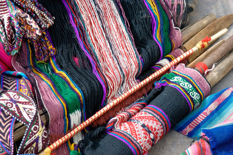 Colorful wooven textiles in a marketplace