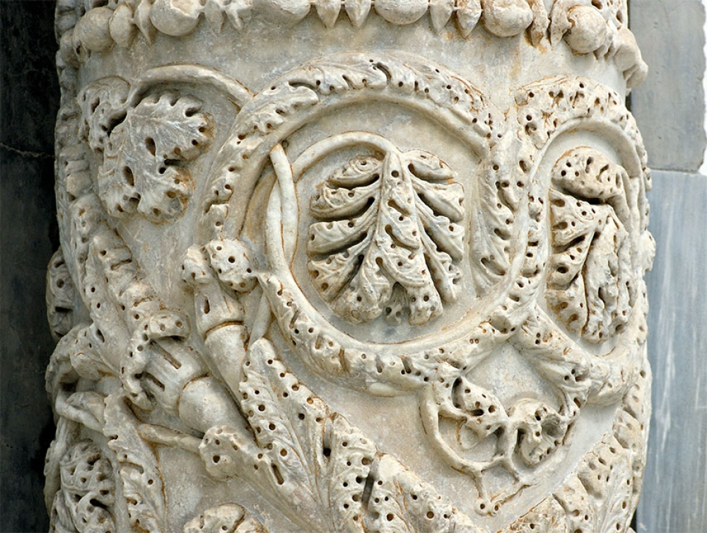 decorative carvings in columns pisa italy photo 1214le