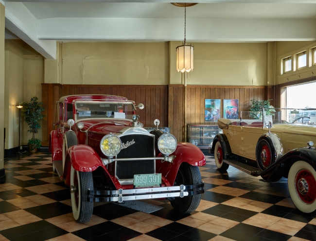 Display of classic Packard automobiles at America