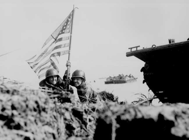 First flag on Guam on boat hook mast