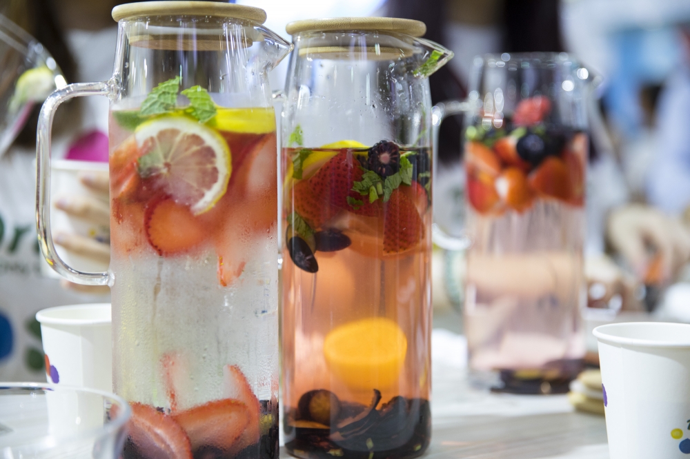 glass water pitchers filled with fruit