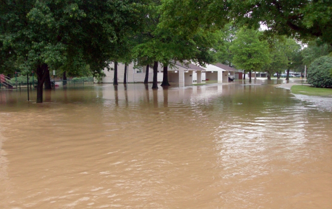 major flooding after heavy rains breeched nearby protective leve