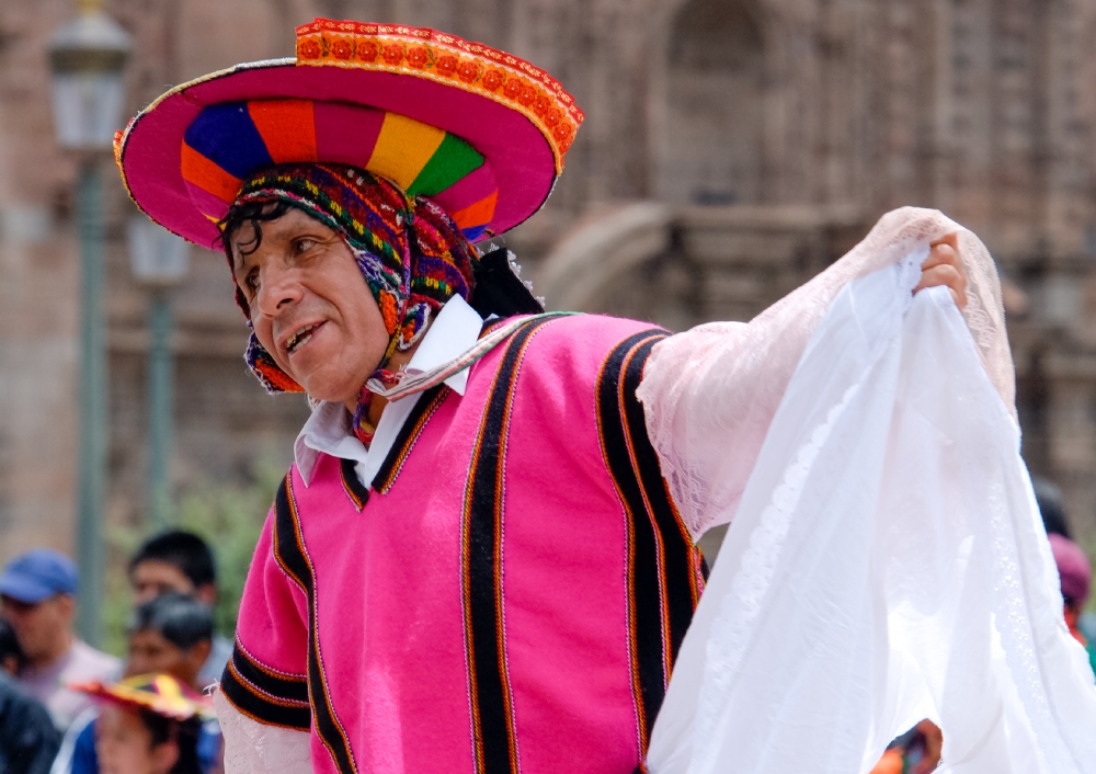 men wearing colorful traditional costumes cusco peru 011