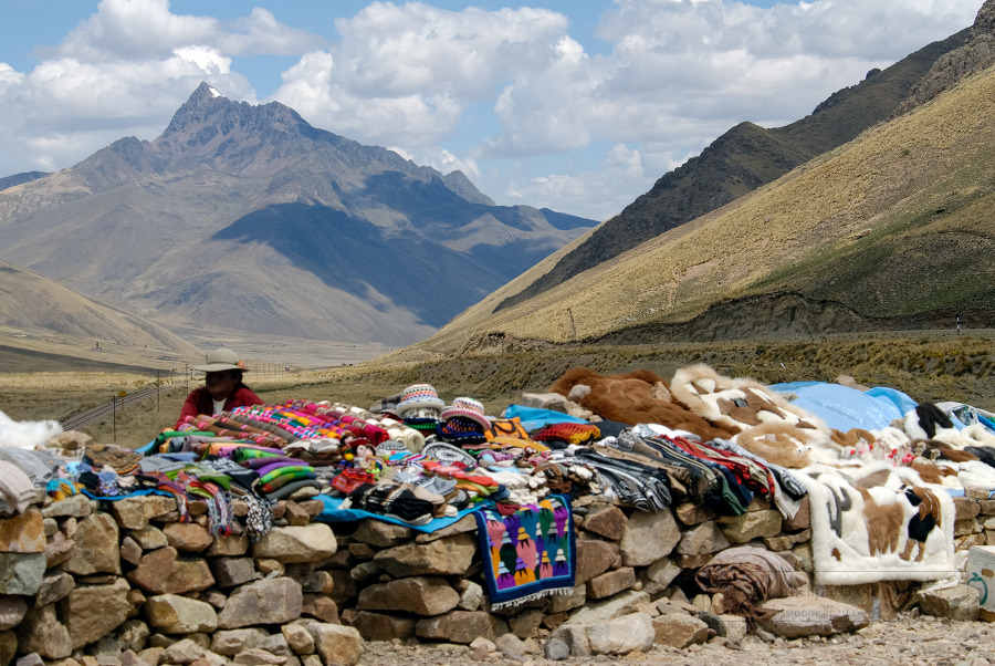 Natives selling colourful ponchos and blankets