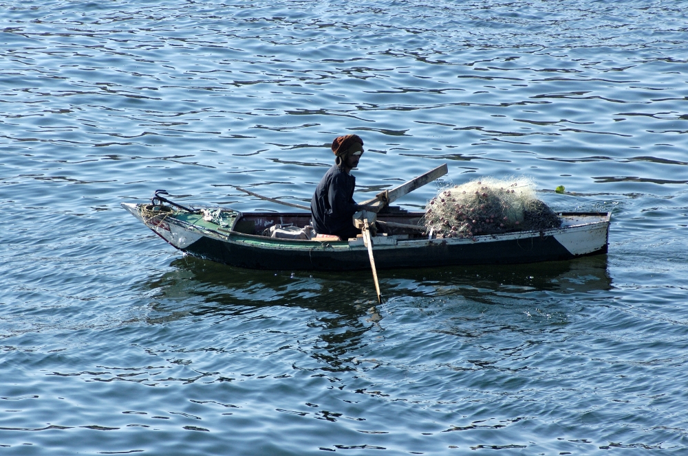 nile river boat with fishing net egypt 5991