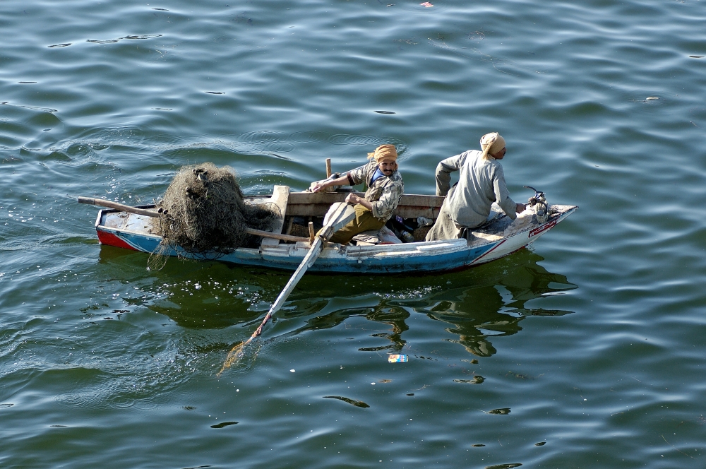 nile river boat with fishing net egypt 5999