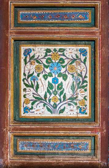 ornately painted flowers onwood panel marrakesh morocco photo