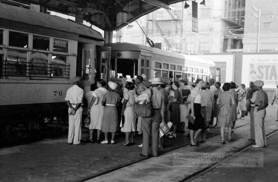 People entering exiting a streetcar in a Terminal Oklahoma 1939