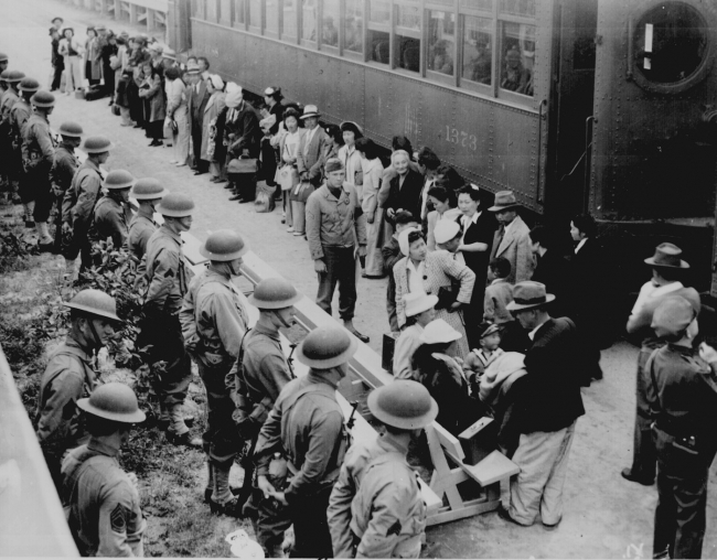 Persons of Japanese ancestry arrive at the Santa Anita Assembly 
