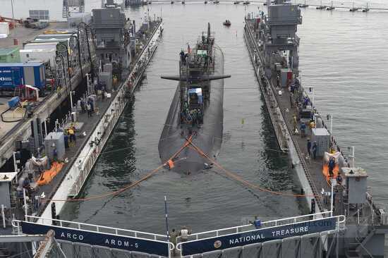 pulls into the floating dry dock at Naval Base Point Loma