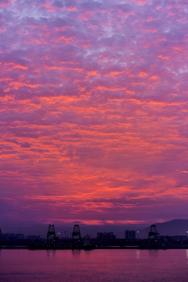 purple orange sunset along river in Myanmar Asia