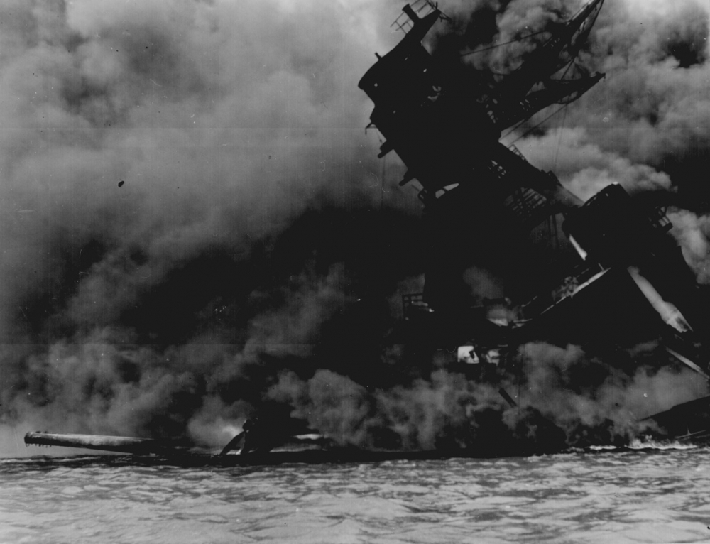 The USS ARIZONA burning after the Japanese attack
