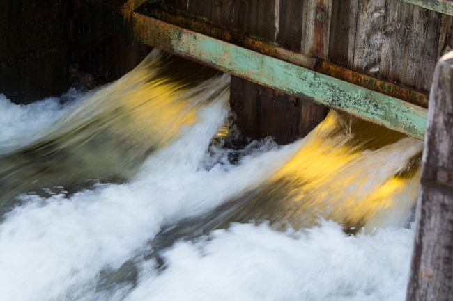 water rushing through a lock on the Dalsland Canal Hafverud Sweden