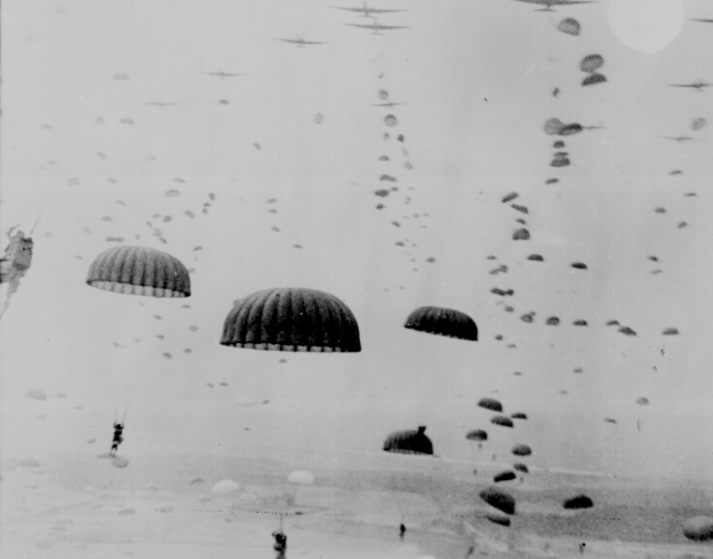waves of paratroops land in Holland