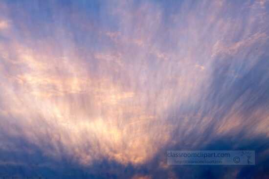 wispy colorful clouds at sunset