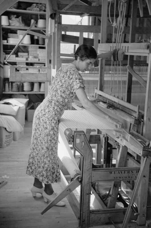 Woman weaving at the Tygart Valley