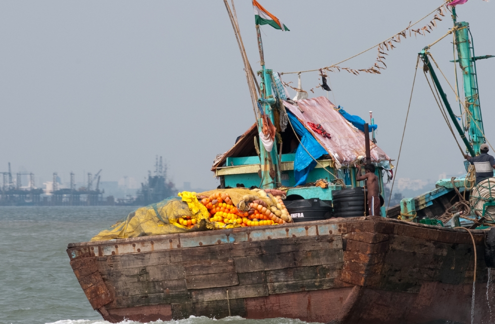 Wooden fishing boats in Arabian Sea near Mumbai Photo