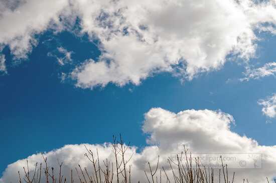 winter-blue-sky-with-white-puffs-of-cumulus-clouds-classroom-clip-art