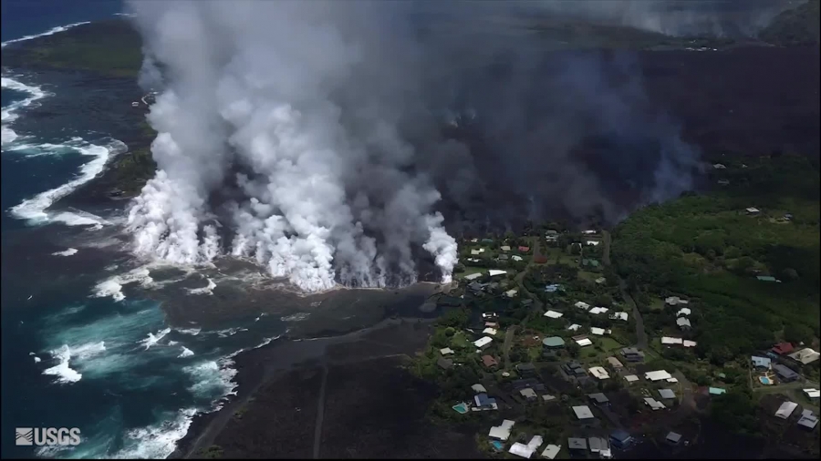 kapoho bay during a helicopter overflight lava entering ocean