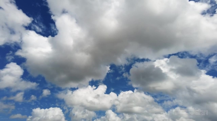 slow motion of clouds in a summer blue sky