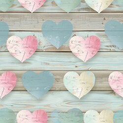 artistic wooden hearts arranged on a textured blue wooden