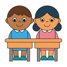 boy and girl sitting together at a desk in their classroom
