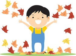 boy celebrating autumn with falling leaves clipart