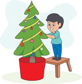 boy decorating christmas tree 2