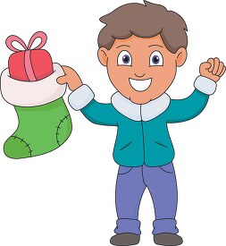 boy holding christmas stocking with gift copy