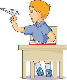 boy holding paper airplane