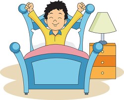 boy in bed waking up in the morning clipart