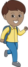 boy in school uniform running towards school