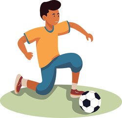 boy kneels to pick up a soccer ball