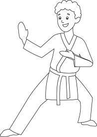 boy practices hand and kick karate moves black outline clipart