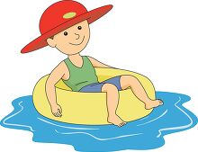 boy wearing hat in pool sitting inner tube