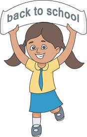 girl in school uniform shows back to school sign