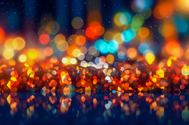 abstract bokeh background with brightly colored shinning lights