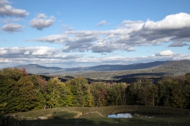 alley and distant mountain ridges seen from Stowe Vermont