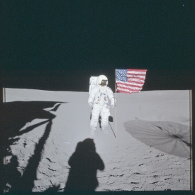 apollo 14-Down-Sun portrait of Ed at the US flag