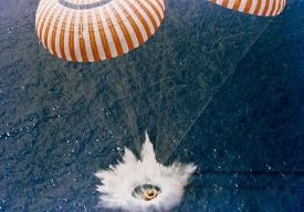 Apollo 15 CM and chutes in water following splashdown