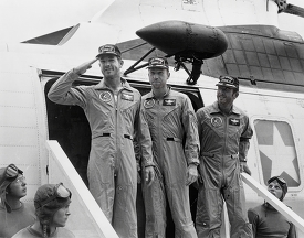 Apollo 15 crew exits recovery helicopter