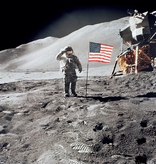 Apollo 15 Lunar Module Pilot James Irwin salutes the U.S. flag