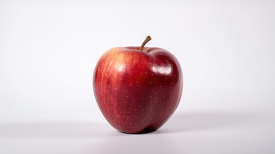 Aripe red apple with stem on white background